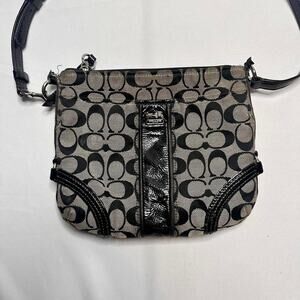 Coach CrossBody Print Black Has Pocket In the Front Zipper Closure